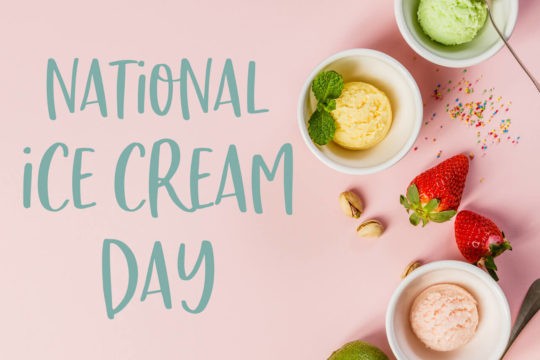 The text 鈥楴ational Ice Cream Day鈥� surrounded by ice cream and toppings.