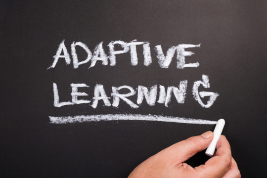 鈥楢daptive Learning鈥� written on a chalkboard.